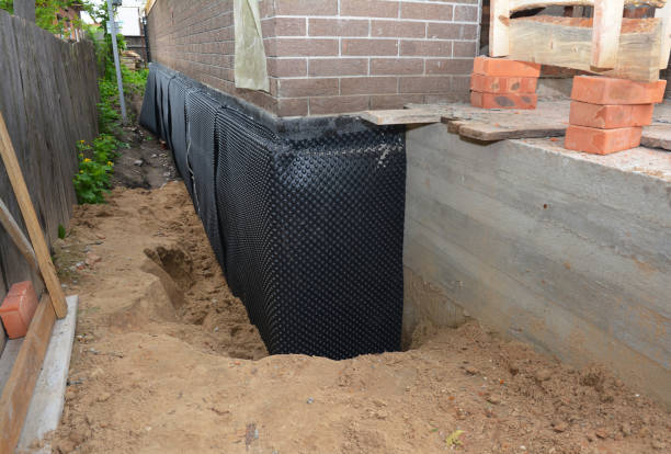 Happy homeowners after waterproofing job in Fillmore